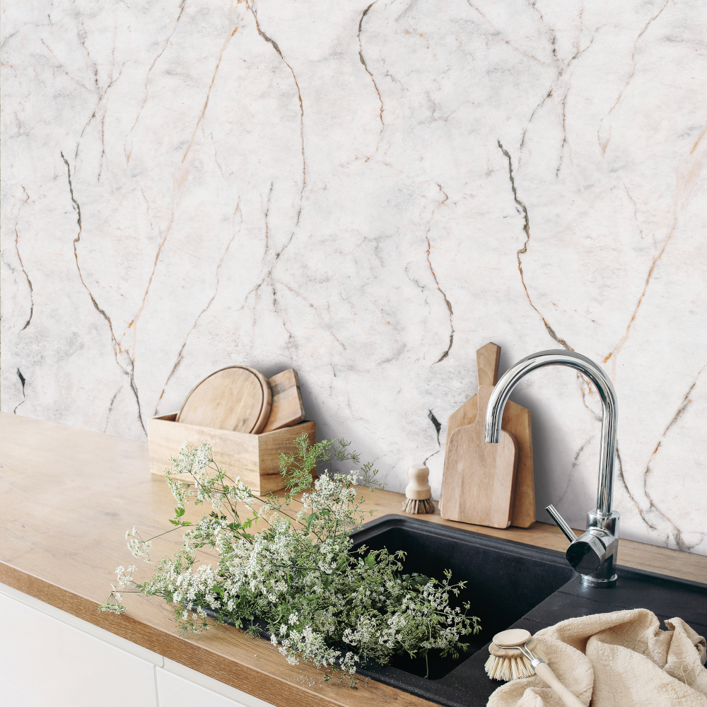 Closeup of kitchen interior. White brick wall, metro tiles, wooden countertops with chopping boards. Cow parsley plants in black sink. Modern scandinavian design. Home staging, cleaning concept. Πλαστική επένδυση Ραμποτέ PVC VILO Gold Marble 25x265 cm - Image 3